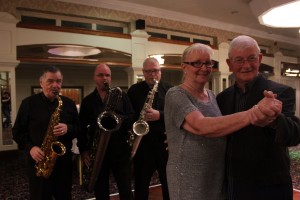 Rita Murray and Herbie Rennie are joined by sax players (right to left) Gerry Rice, Noel Kerr and John McClure from the Balmoral Big Band 