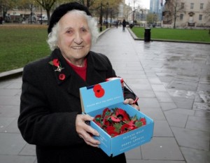 Poppy seller Olive Cooke 91 outside Bristol Cathedral.See swns story SWPOPPY. Britain's longest-serving poppy seller was yesterday (Fri) raising money for the charity for the 75th consecutive year. Olive Cooke, 91, started selling poppies in 1936 to help raise money for her father's legion which was still in the process of being rebuilt after suffering the ravages of WW1.  And the dedicated nonagenarian has maintained her hard work, raising thousands for charity over the past eight decades. Mrs Cooke was back on the streets this weeks in the run up to Remembrance Day, continuing to raise vital funds for the much-loved organisation. When selling poppies, Mrs Cooke proudly wears her British Royal Legion medal alongside the distinguished service medal awarded to her husband Leslie for bravery in hazardous conditions. She is also helping to raise £10,000 for Help for Heroes by teaming up with local singer John Billitteri by getting one million pennies of donations. Mrs Cooke said she was inspired to help because she believes Help for Heroes, and the Royal British Legion, combine together to help soldiers returning from war.