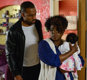 WARNING: Embargoed for publication until: 19/05/2015 - Programme Name: EastEnders - TX: 26/05/2015 - Episode: 5074 (No. n/a) - Picture Shows: A shaken Kim tells Vincent to get out. Vincent (RICHARD BLACKWOOD), Kim Fox-Hubbard (TAMEKA EMPSON) - (C) BBC - Photographer: Kieron McCarron