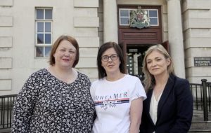 Siobhan McLaughlin (centre) with her legal representative Laura Banks (right) and Denise Forde, Citizens Advice..